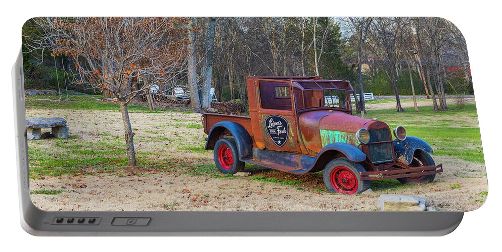 Truck Portable Battery Charger featuring the photograph Leiper's Fork Inn by Lorraine Baum