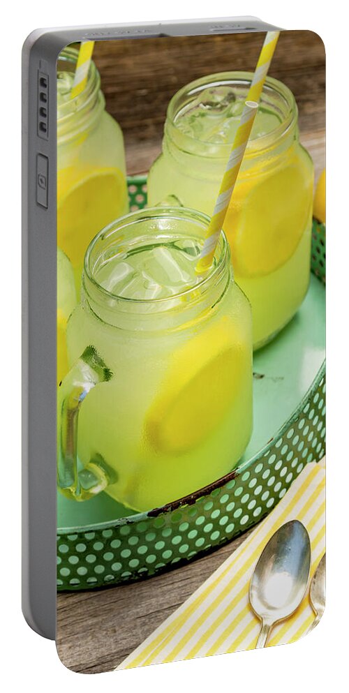 Background Portable Battery Charger featuring the photograph Lemonade in Blue Tray by Teri Virbickis