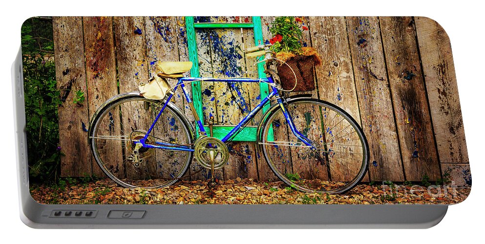 American Portable Battery Charger featuring the photograph Lewistown Garden Bicycle by Craig J Satterlee