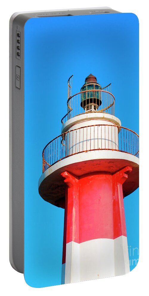 Psi Portable Battery Charger featuring the photograph Light house at the old Jaffa port by Tomi Junger