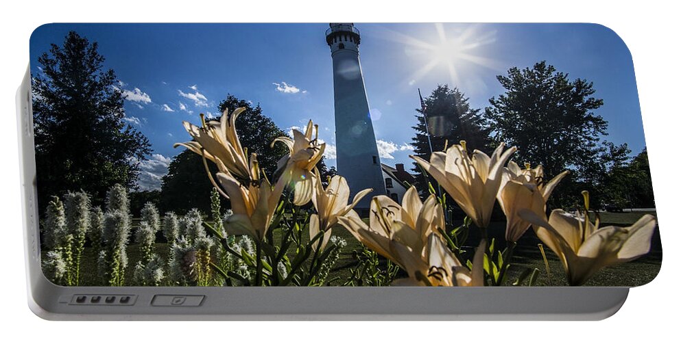 Wind Point Lighthouse Portable Battery Charger featuring the photograph Lighthouse with a flowery foreground by Sven Brogren