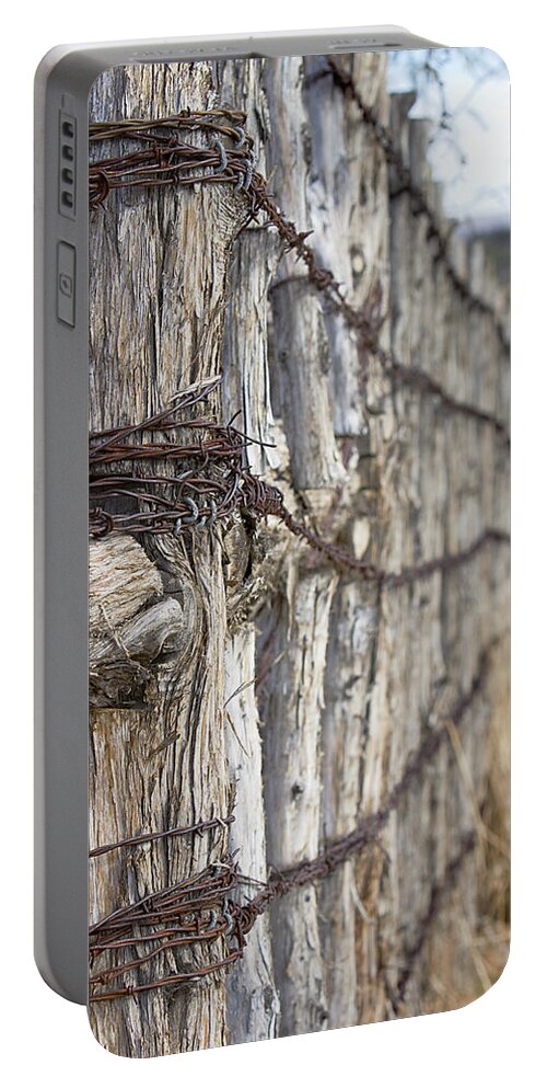 Fence Portable Battery Charger featuring the photograph Log And Wire Fence by Phyllis Denton