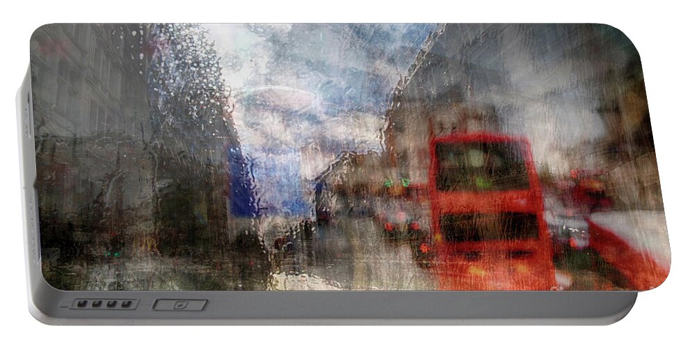 Rain Portable Battery Charger featuring the photograph London in rain by Ariadna De Raadt
