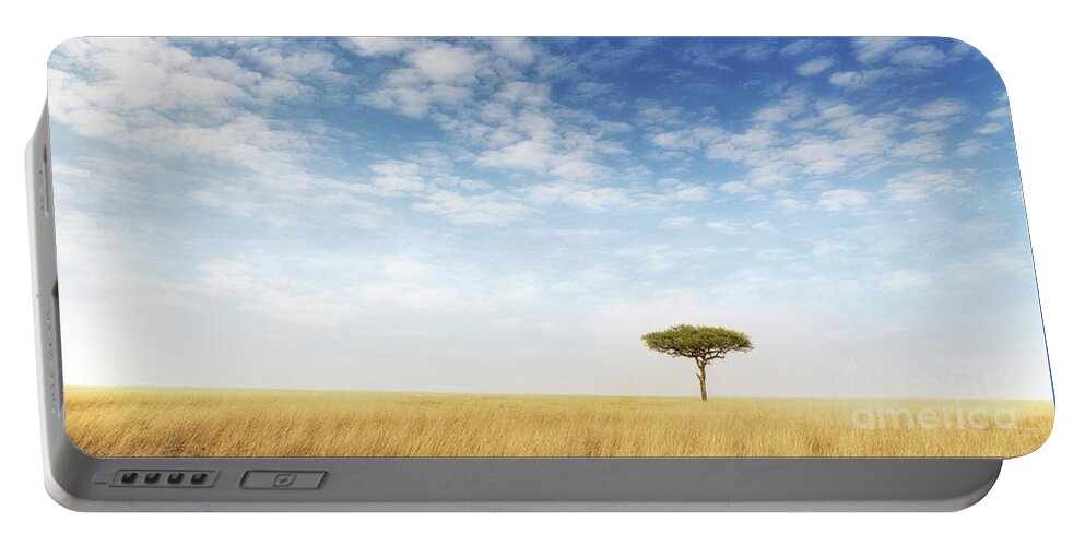 Mara Portable Battery Charger featuring the photograph Lone acacia tree in the Masai Mara by Jane Rix