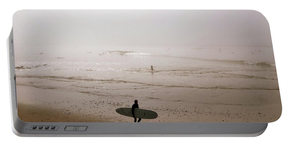 Surfer Portable Battery Charger featuring the photograph Lonely Surfer by Marilyn MacCrakin