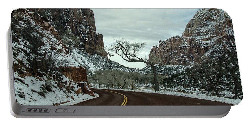 Utah Portable Battery Charger featuring the photograph Lonesome snowy winter in Zion by Gaelyn Olmsted