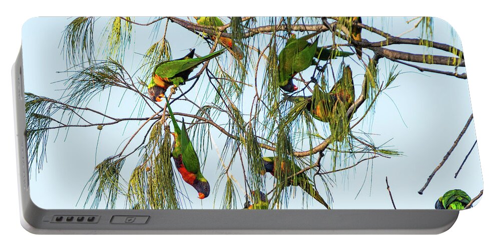 2017 Portable Battery Charger featuring the photograph Lorikeets swarming from tree to tree by Andrew Michael