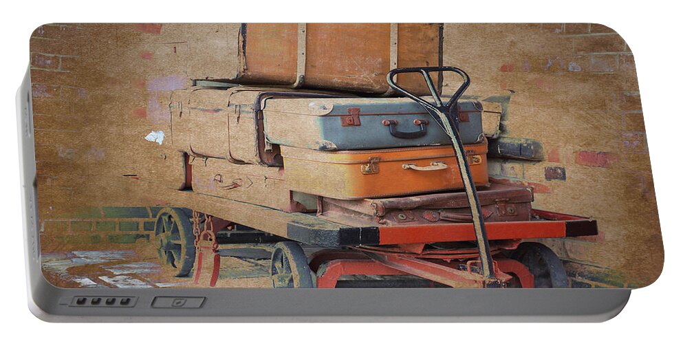 Luggage Portable Battery Charger featuring the photograph Lost Luggage by David Birchall