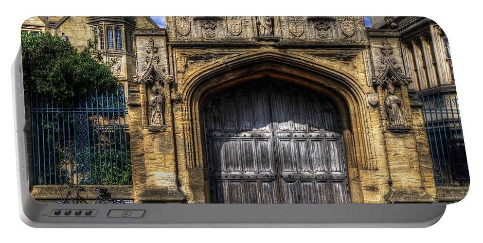 Yhun Suarez Portable Battery Charger featuring the photograph Magdalen College Door - Oxford by Yhun Suarez