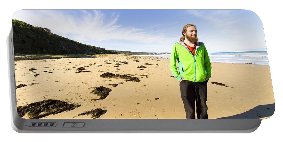 Victoria Portable Battery Charger featuring the photograph Man relaxing on beautiful Australian coast by Jorgo Photography