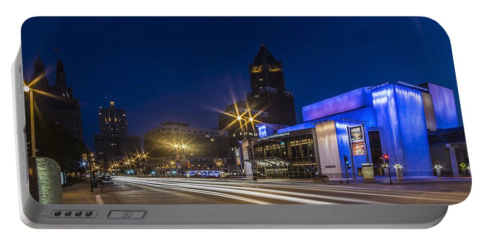 Marcus Center For Performing Arts Portable Battery Charger featuring the photograph Center for Performing arts building at dusk in Milwaukee by Sven Brogren