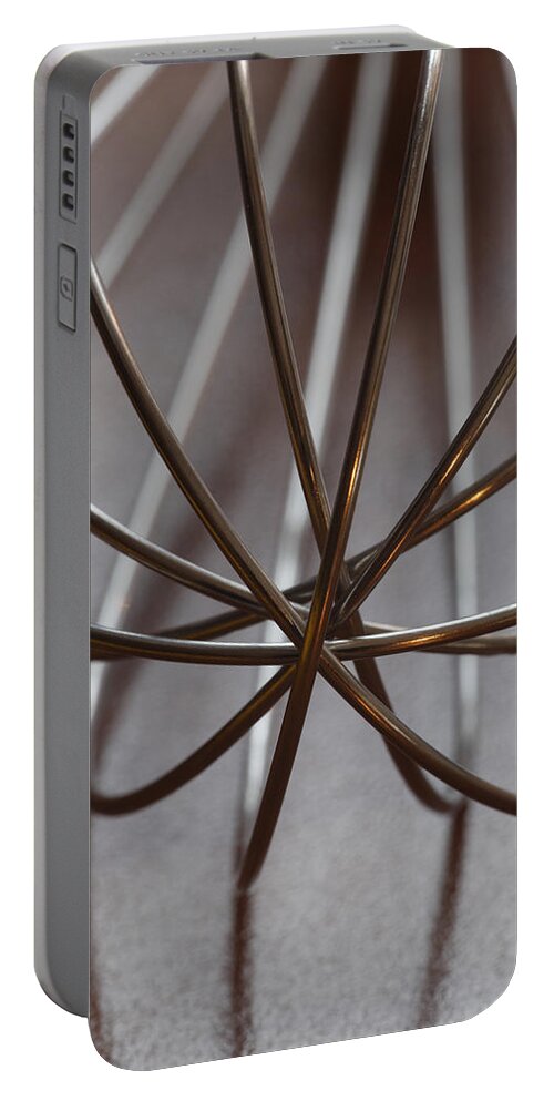 Still Life Portable Battery Charger featuring the photograph Metal whisk on a table by Ulrich Kunst And Bettina Scheidulin