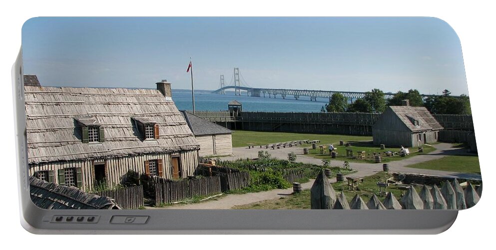 Colonial Michilmackinac Portable Battery Charger featuring the photograph Michilimackinac and Mackinac Bridge by Keith Stokes