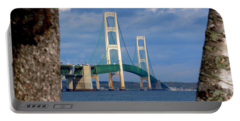 Mackinac Bridge Portable Battery Charger featuring the photograph Mighty Mac Framed by Trees by Keith Stokes