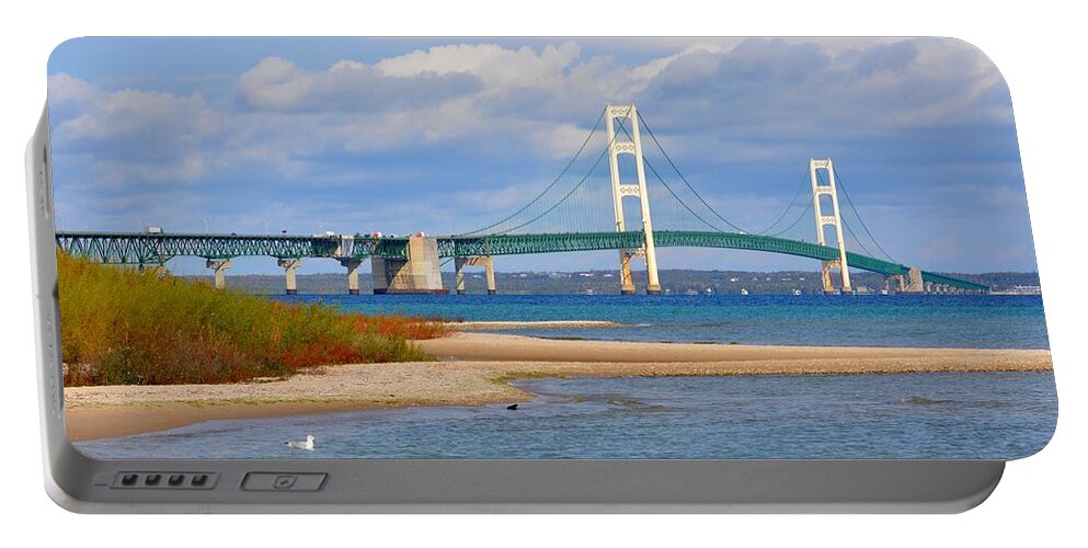 Michigan Portable Battery Charger featuring the photograph Mighty Mac in October by Keith Stokes