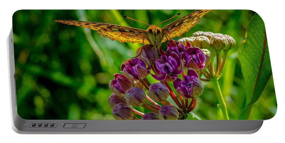Insect Portable Battery Charger featuring the photograph Milkweed Buffet by Jeff Phillippi