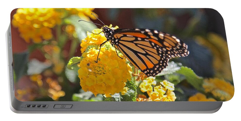 Monarch Portable Battery Charger featuring the photograph Monarch Butterfly on Lantana by Liz Vernand