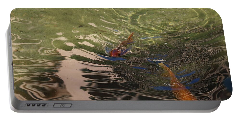 Koi Portable Battery Charger featuring the photograph Monte Carlo Koi by Laura Davis