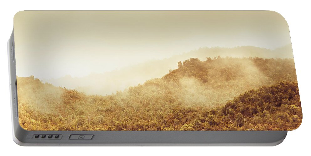 Moody Portable Battery Charger featuring the photograph Moody mountain morning by Jorgo Photography