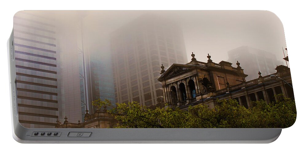 Treasury Portable Battery Charger featuring the photograph Morning Fog over the Treasury by Susan Vineyard