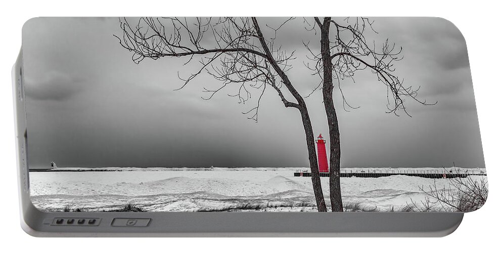 Clouds Portable Battery Charger featuring the photograph Muskegon Lighthouse in Winter by Joe Holley