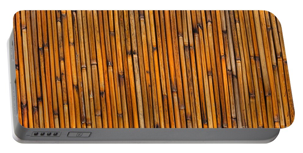 Aged Portable Battery Charger featuring the photograph Natural Bamboo Background by Olivier Le Queinec