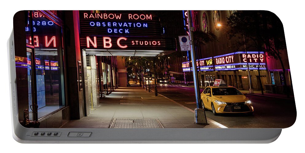 Nyc Portable Battery Charger featuring the photograph NBC Studios and Cab by John McGraw