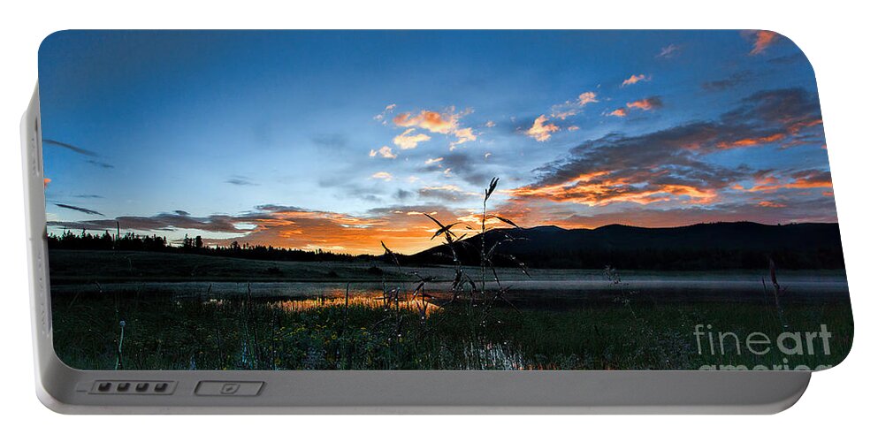 Sunrise Portable Battery Charger featuring the photograph Night's Retrteat by Jim Garrison