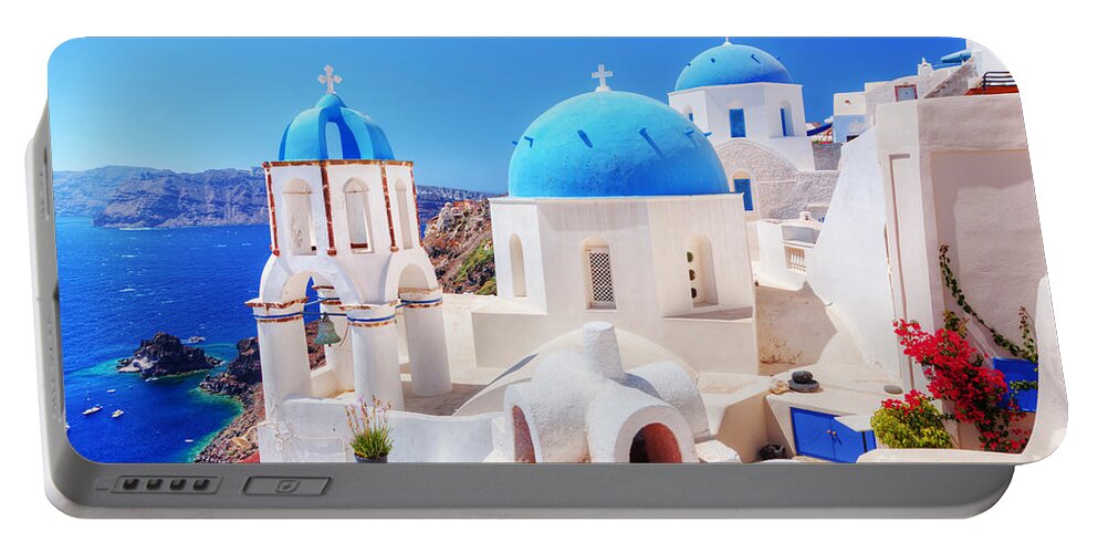 Greece Portable Battery Charger featuring the photograph Oia town on Santorini island Greece Aegean sea by Michal Bednarek