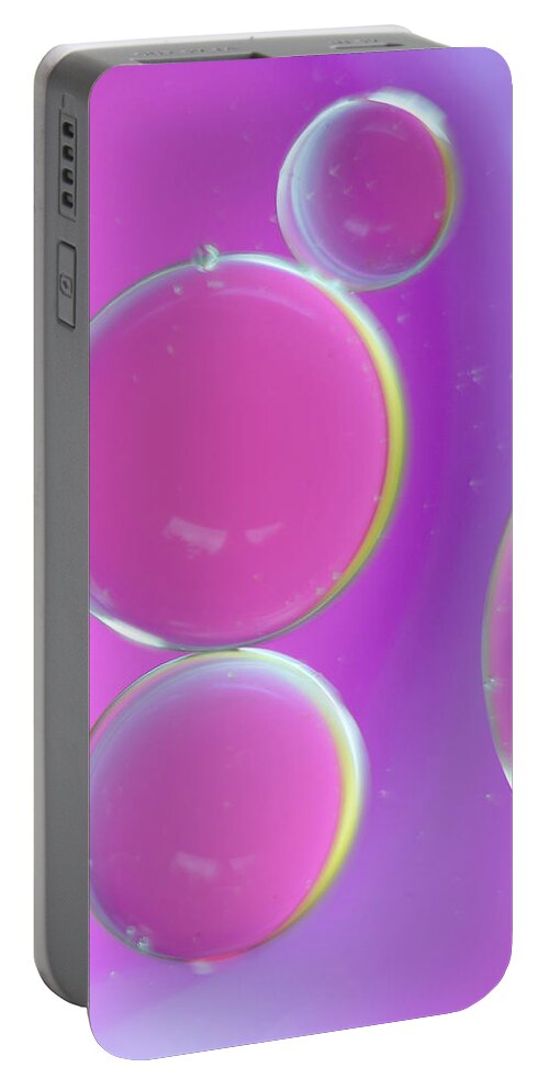 Water Portable Battery Charger featuring the photograph Oil on water abstract by Andy Myatt