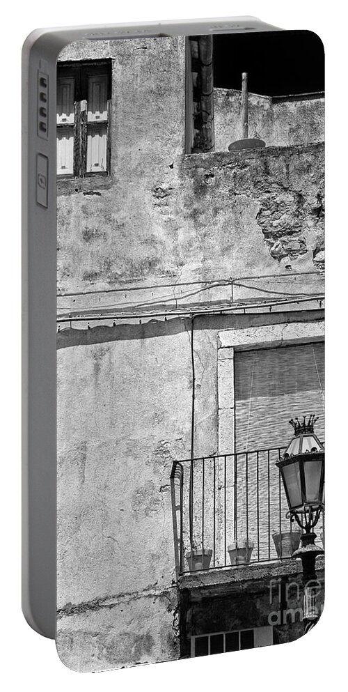 Black And White Portable Battery Charger featuring the photograph Old house in Taormina Sicily by Silvia Ganora