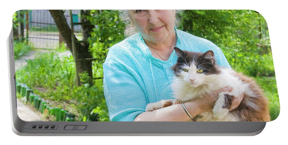 People Portable Battery Charger featuring the photograph Old lady with cat by Irina Afonskaya