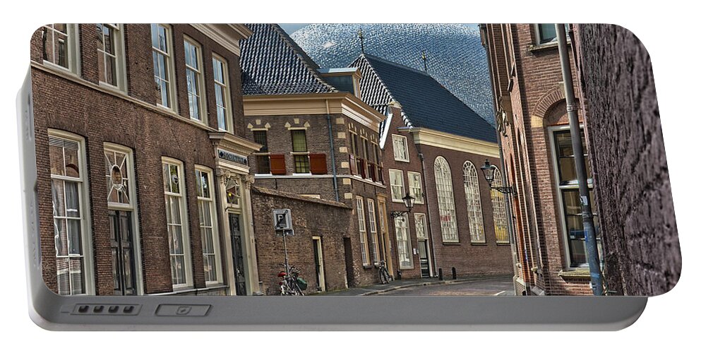 Zwolle Portable Battery Charger featuring the photograph Old Meets New in Zwolle by Frans Blok