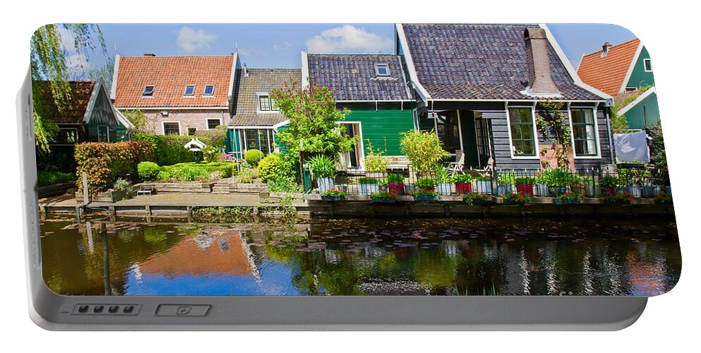 Netherlands Portable Battery Charger featuring the photograph old town of Zaandijk, Netherlands by Anastasy Yarmolovich