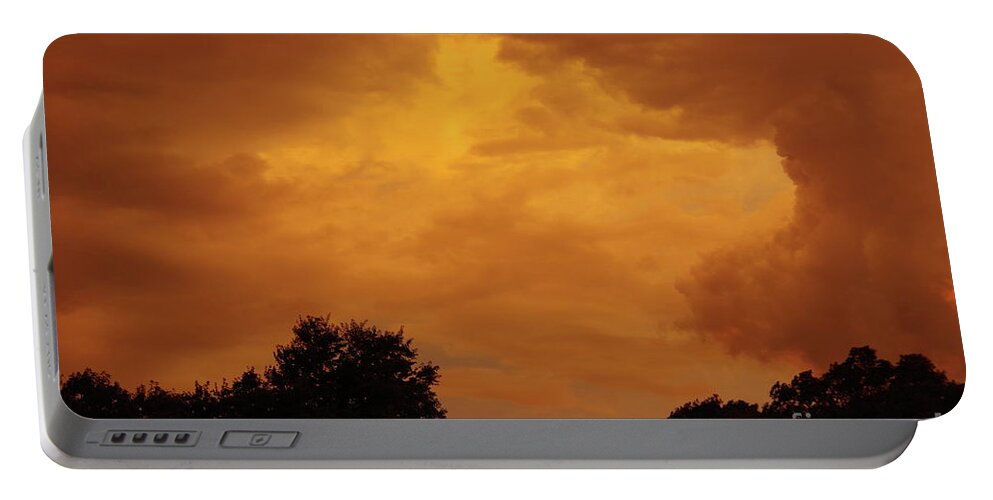 Clouds Portable Battery Charger featuring the photograph Orange clouds by Tannis Baldwin