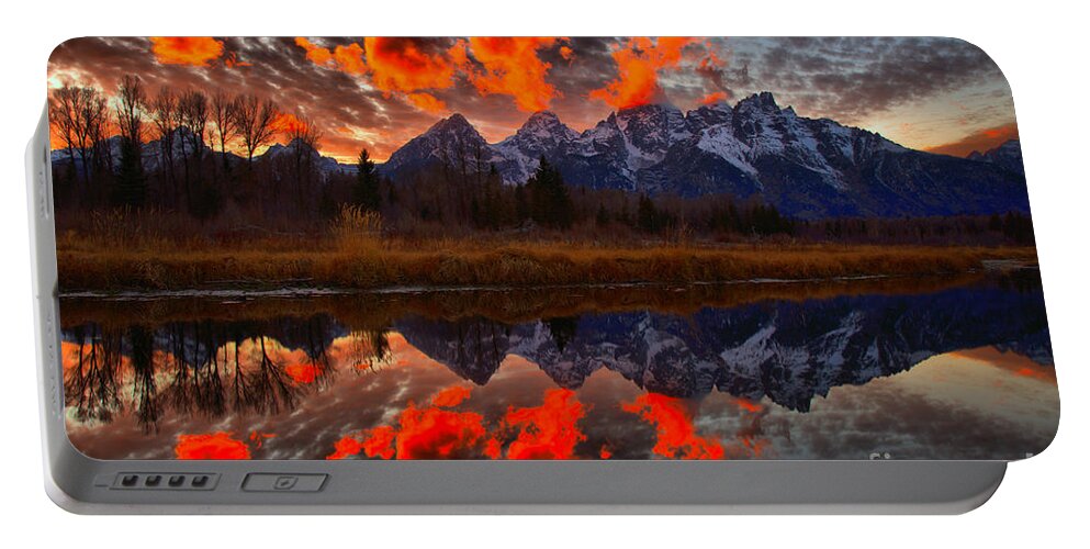 Schwabacher Landing Portable Battery Charger featuring the photograph Orange Sunset Highlights Over The Tetons by Adam Jewell