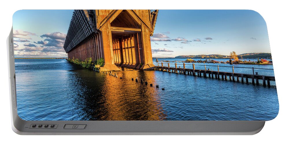 Water Portable Battery Charger featuring the photograph Ore Dock by Joe Holley