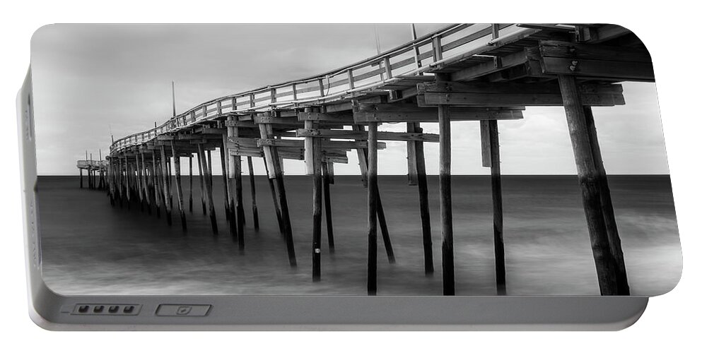 Outer Banks Portable Battery Charger featuring the photograph Outer Banks Avon Fishing Pier in Black and White by Ranjay Mitra