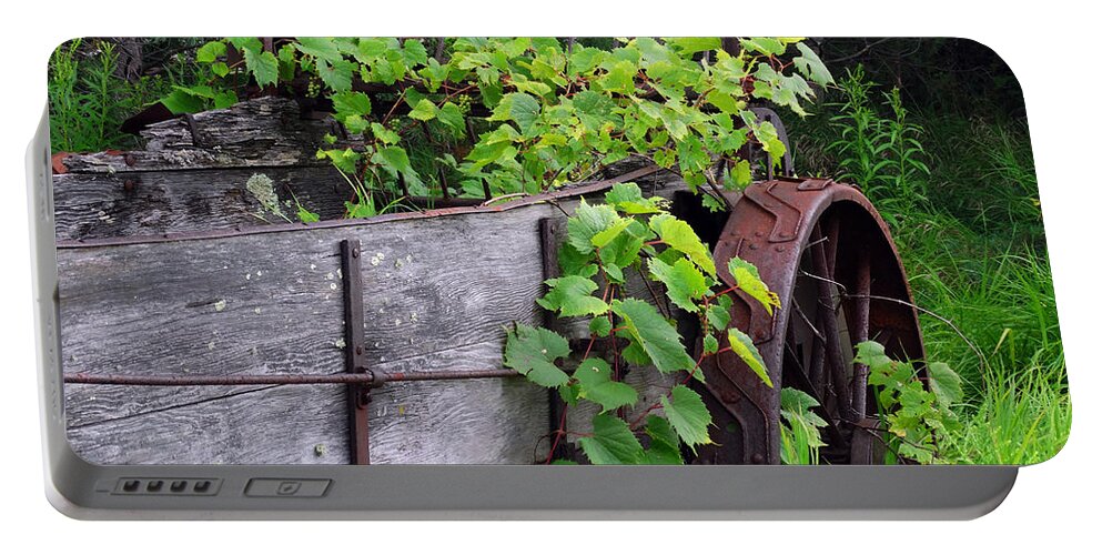 Farm Equipment Portable Battery Charger featuring the photograph Overgrown Farm Implement by David T Wilkinson