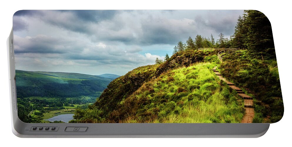 Clouds Portable Battery Charger featuring the photograph Overlooking Glendalough on the Wicklow Way by Debra and Dave Vanderlaan