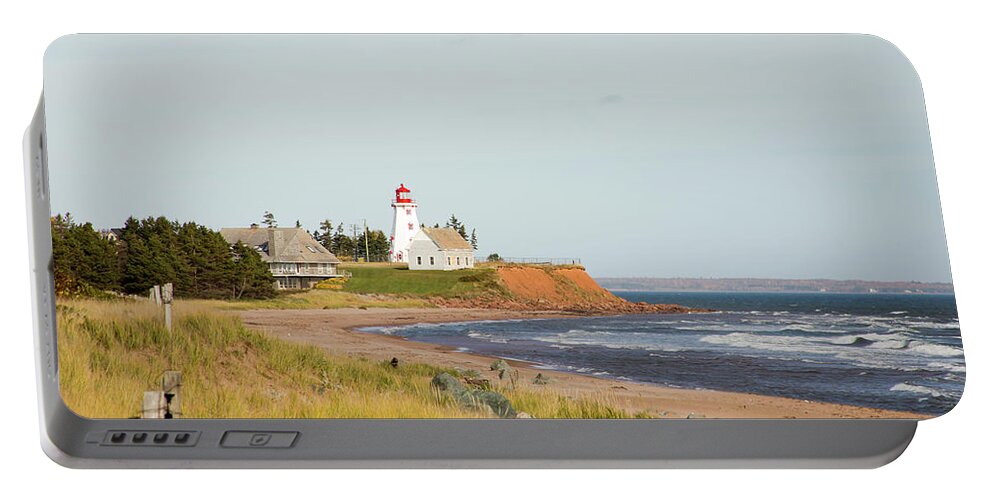 Blue Portable Battery Charger featuring the photograph Panmure Island Lighthouse, PEI by Karen Foley