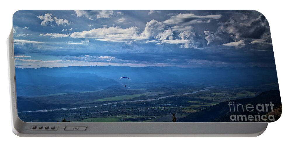 Paragliding Portable Battery Charger featuring the photograph Paragliding above Jackson Hole by Bruce Block