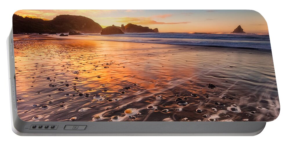 Sunrise Portable Battery Charger featuring the photograph Pebble Beach by Darren White