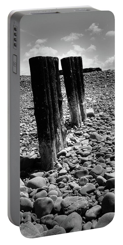 Groynes Portable Battery Charger featuring the photograph Pebbles and Groynes monochrome by Jeff Townsend