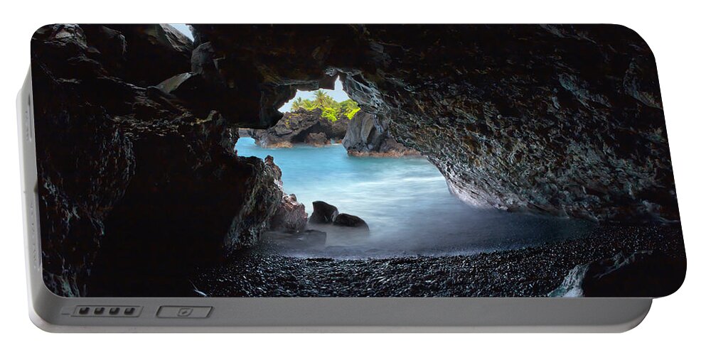 Hana Portable Battery Charger featuring the photograph Peeking Through the Lava Tube by Susan Rissi Tregoning
