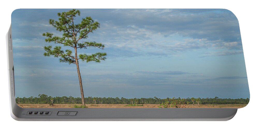 Pine Portable Battery Charger featuring the photograph Pine Tree and Marsh by Tom Claud