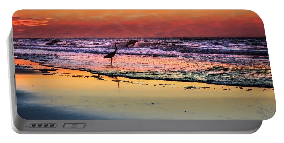 Alabama Portable Battery Charger featuring the photograph Pink Sky and Heron in the Surf by Michael Thomas