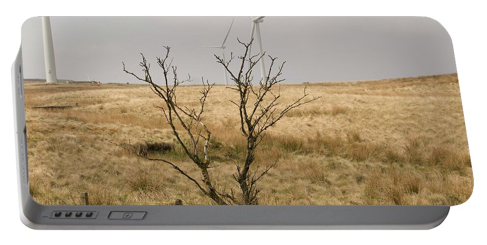 Windmill Portable Battery Charger featuring the photograph Planted. by Elena Perelman