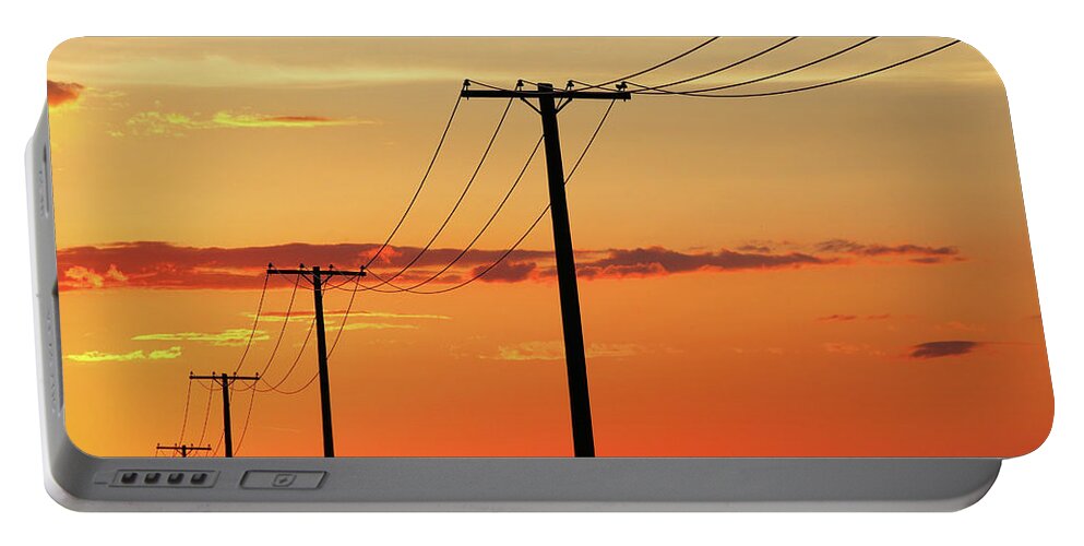 Electrical Portable Battery Charger featuring the photograph Power Line Silhouette by Todd Klassy