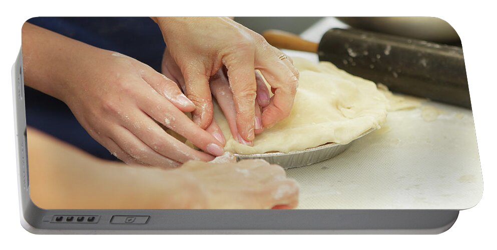 Holiday Pies Portable Battery Charger featuring the photograph Preparing and making apple pies by Kyle Lee